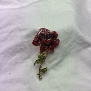 Elegant Red Rose Brooch with Green Accents